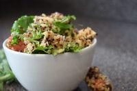 A finished bowl of Mediterranean Kale and Quinoa