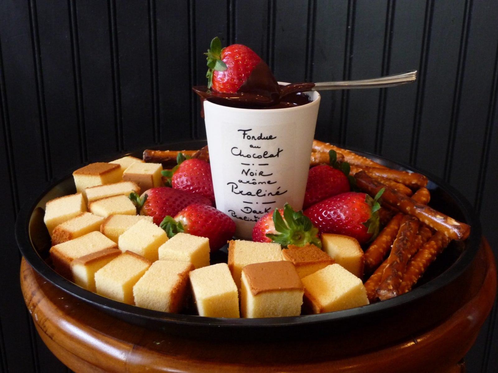 chocolate fondue with pound cake and strawberrires
